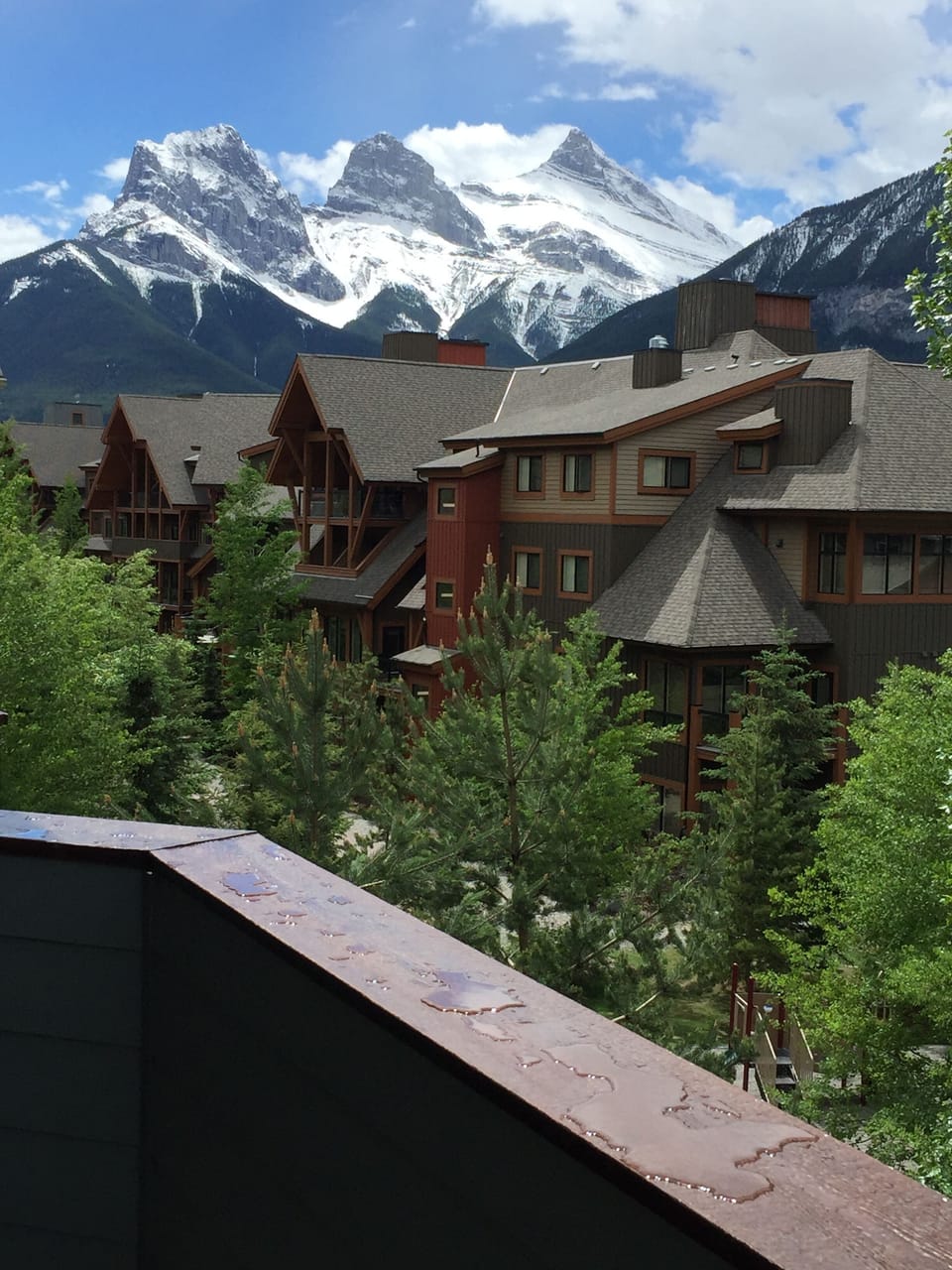 SE view from the balcony on the Three Sisters, signature mountain of Canmore.