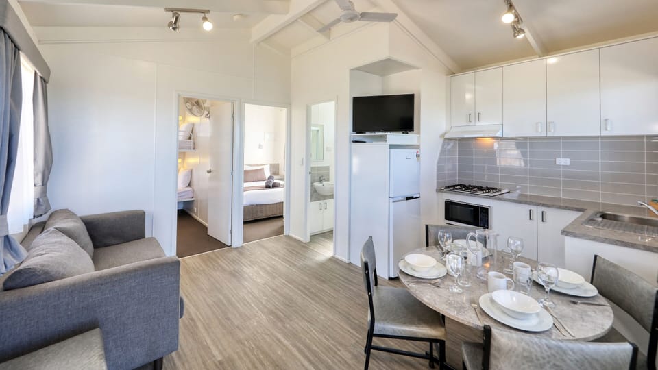 Deluxe Cabin, Lake View | Private kitchen | Full-size fridge, microwave, stovetop, toaster