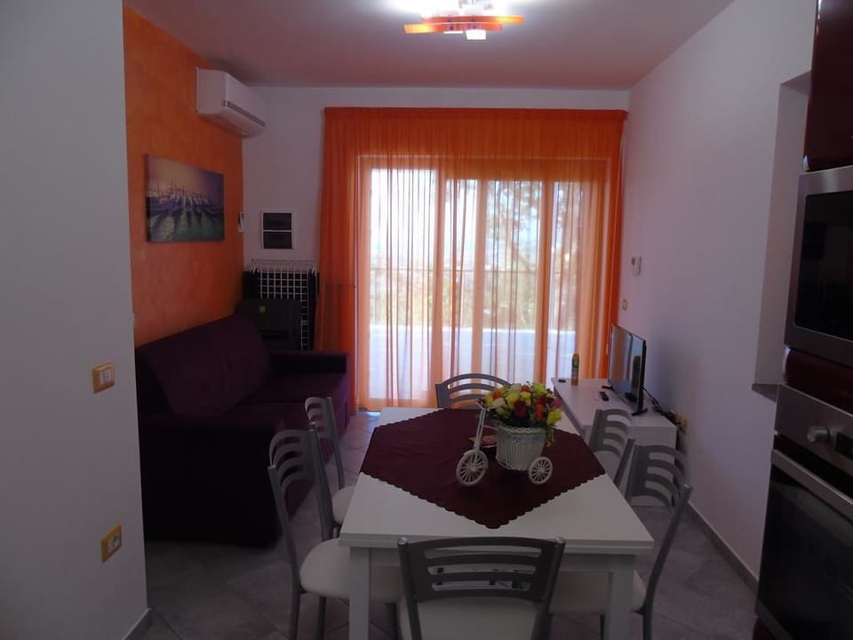 Panoramic Apartment | Living area | Flat-screen TV