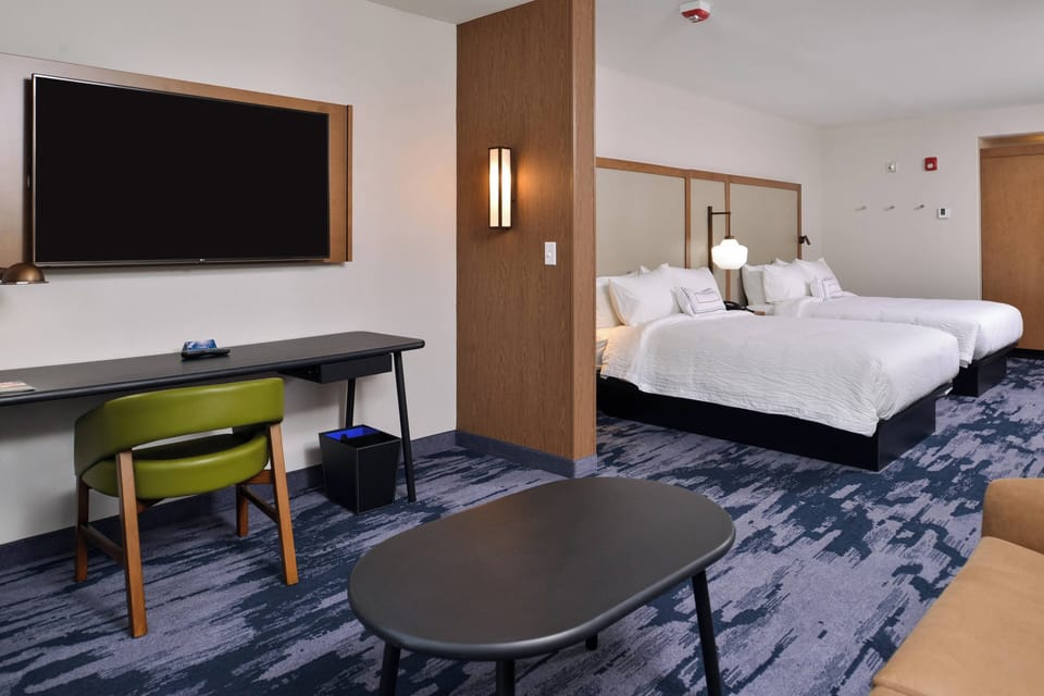 Down comforters, desk, laptop workspace, blackout drapes