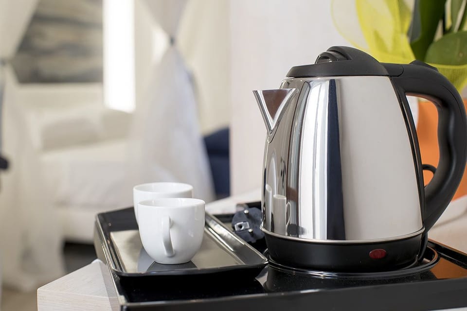 Quadruple Room (Acqua) | Coffee and/or coffee maker