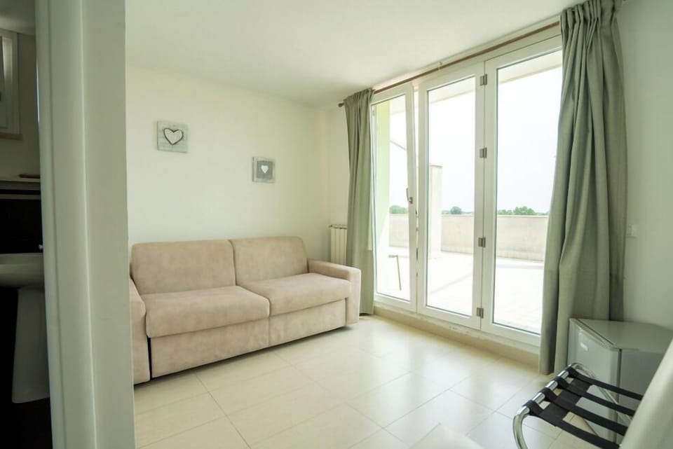 Superior Room | Living area | Flat-screen TV