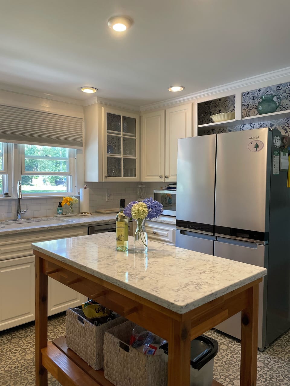 Kitchen with granite countertops and stainless steel appliances 