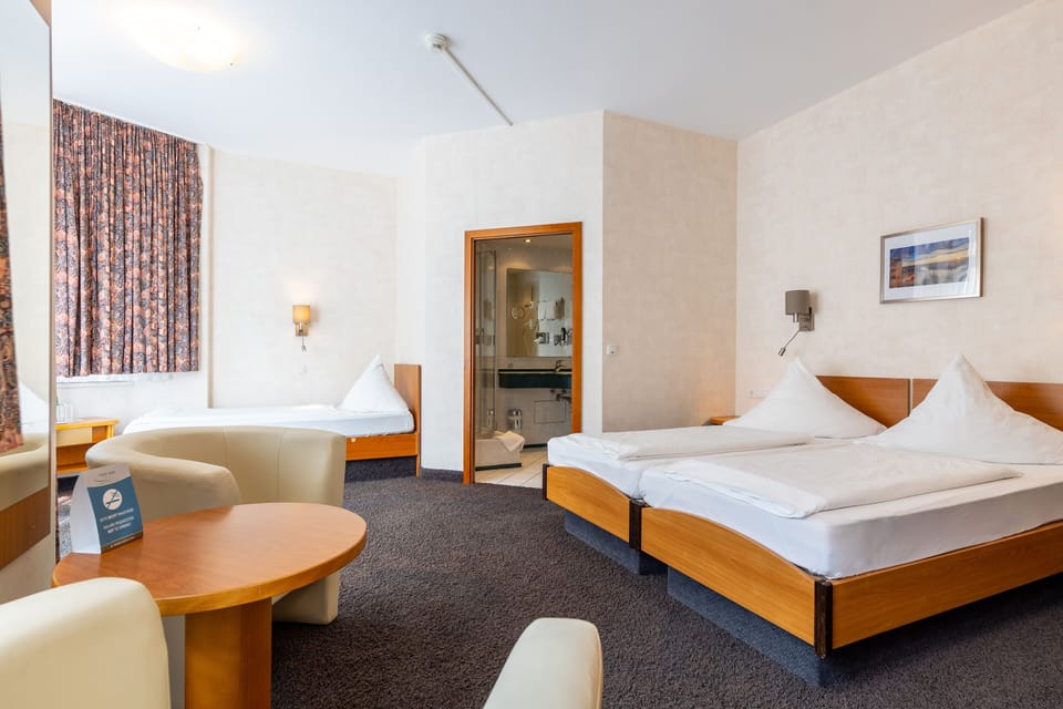 Triple Room, Private Bathroom | Individually decorated, individually furnished, desk, free WiFi