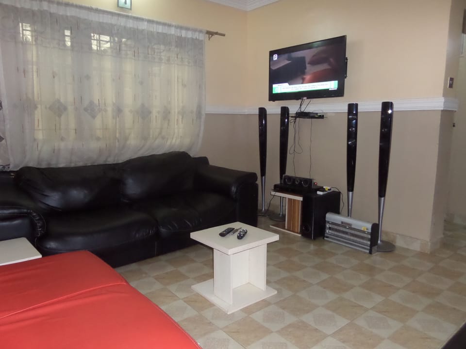 Apartment, 3 Bedrooms | Living room | Flat-screen TV, DVD player