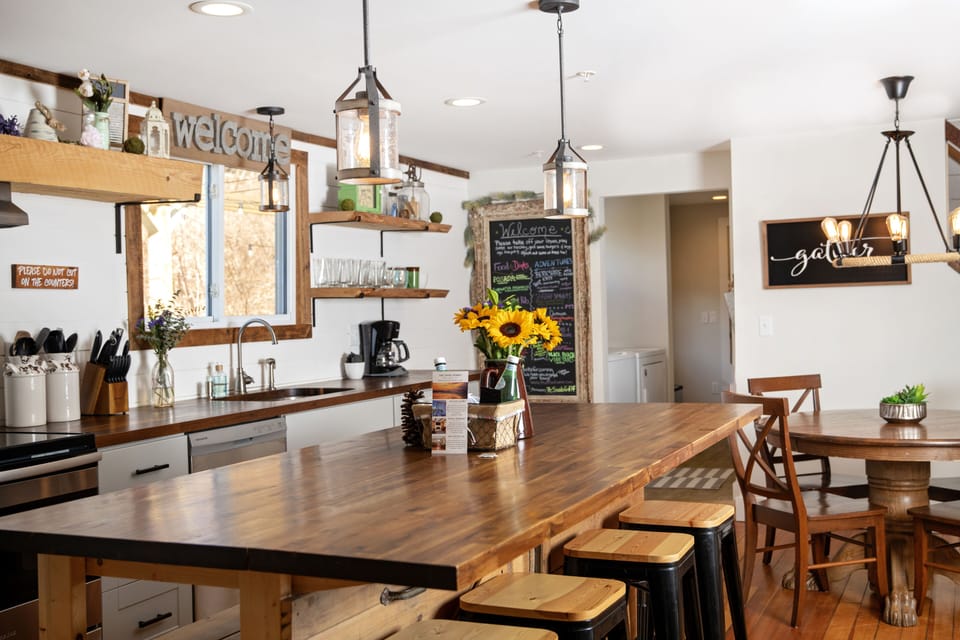 Our Butcher block counter tops and custom island with refurbished door 
