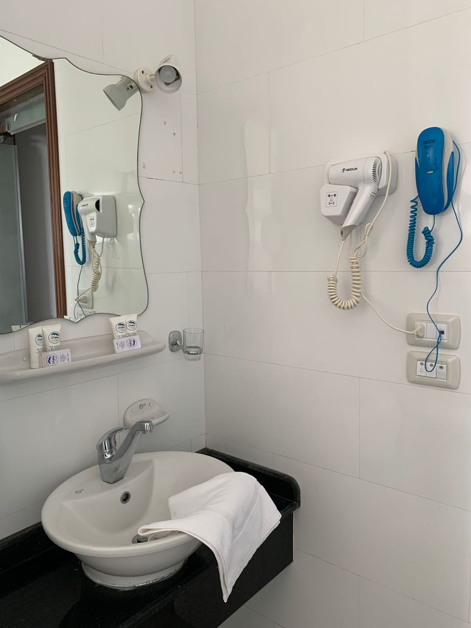 Shower, rainfall showerhead, designer toiletries, hair dryer