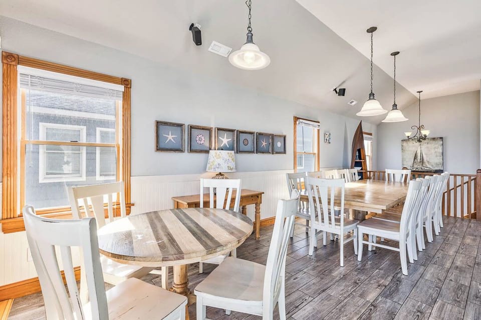 Top-Level Dining Room with Table (seats 12) and Additional Table (seats 4)