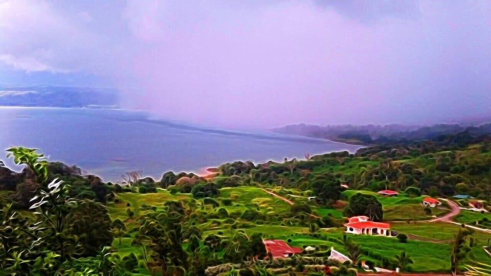 Storm coming across Lake beautiful Lake Arenal when the rain comes across lake