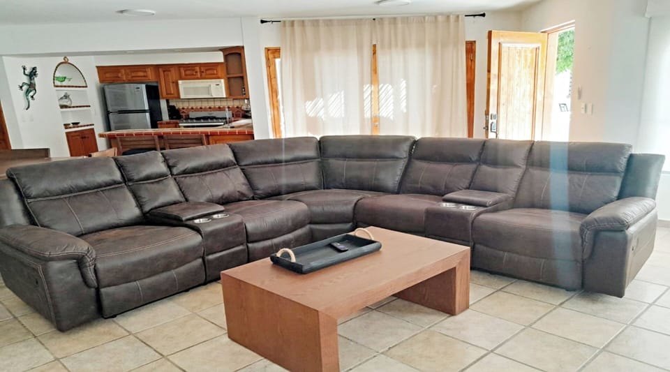 Family Villa | Living area | 32-inch TV with cable channels, DVD player