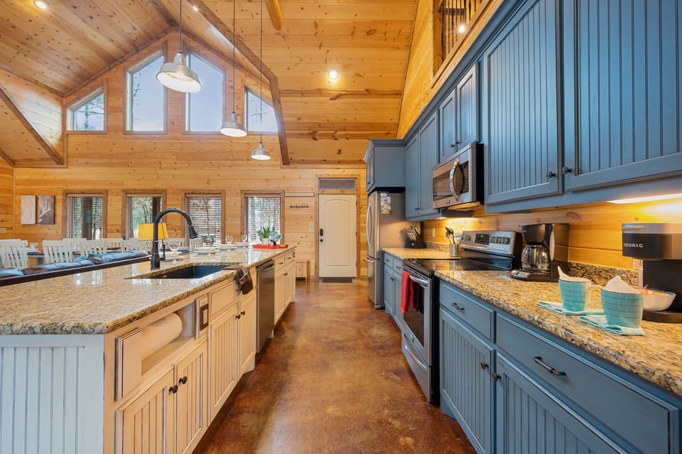 Sleek appliances and rustic charm in one beautiful space