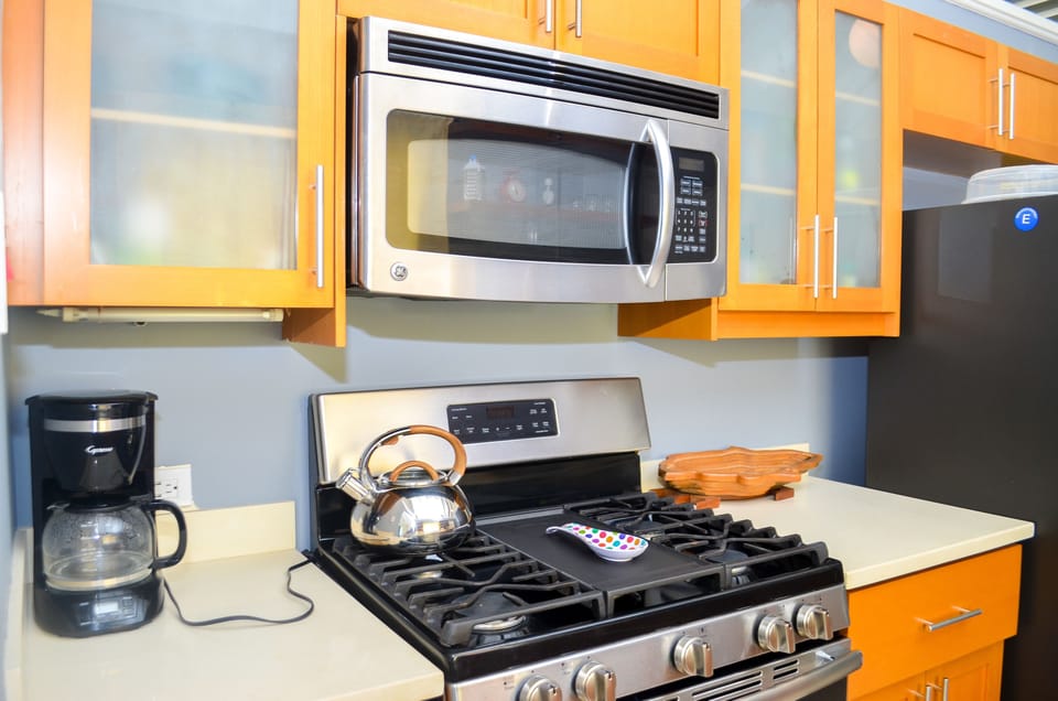 Apartment | Private kitchen | Full-size fridge, microwave, oven, stovetop