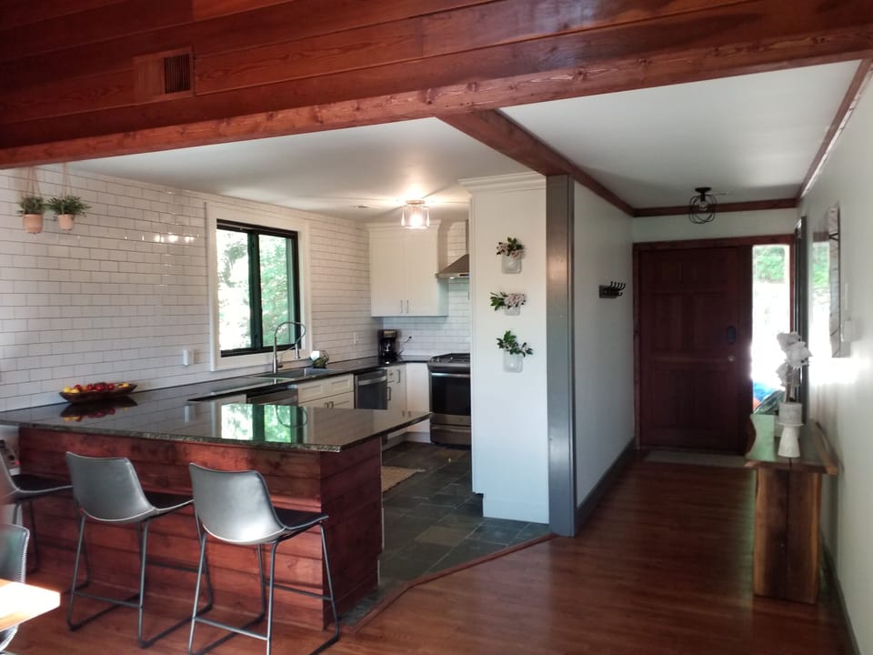 Main Level entry and fully equipped gourmet kitchen