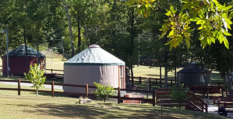 Early Fall pic of 3 yurts  (Dancin' Wolf Yurt is not shown) place is waterfr