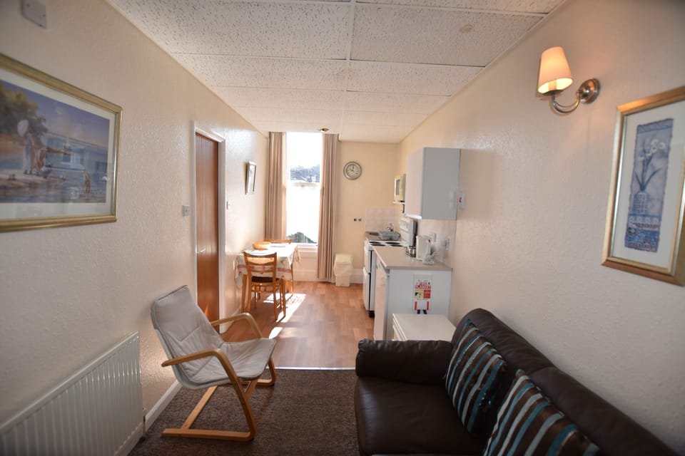 Apartment, 1 Bedroom (Seven) | Iron/ironing board, bed sheets