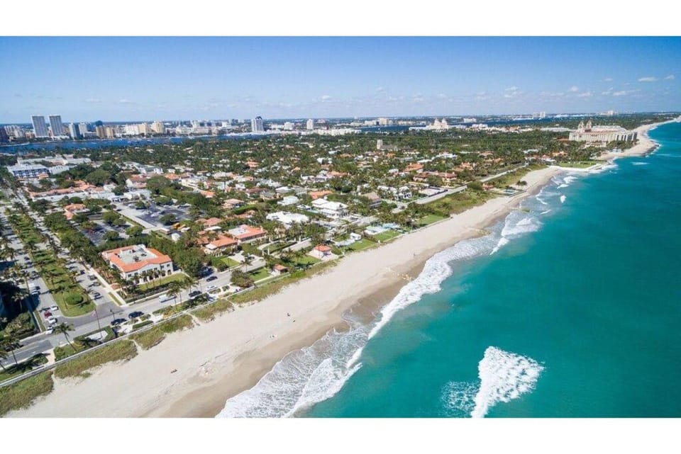 Sweeping beachfront aerial panorama