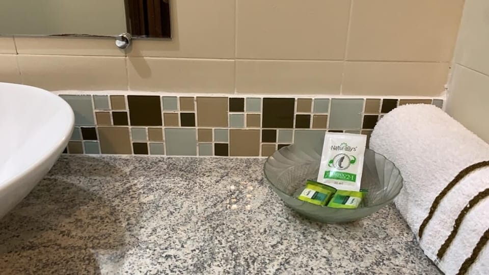 Shower, free toiletries, towels, soap