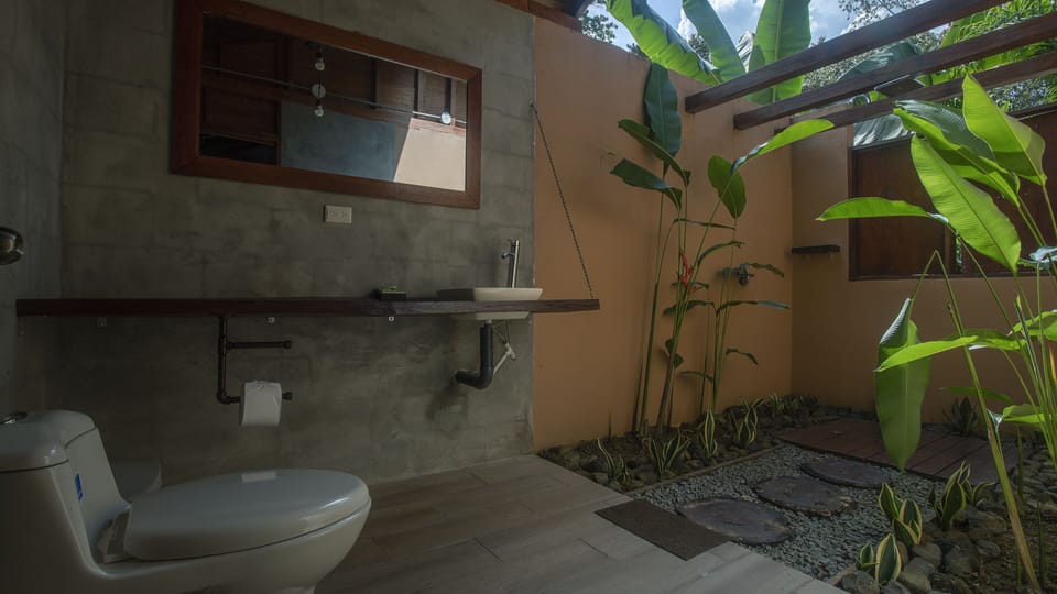 Deluxe Bungalow, 2 Queen Beds (Danto) | Bathroom | Shower, free toiletries, towels, soap