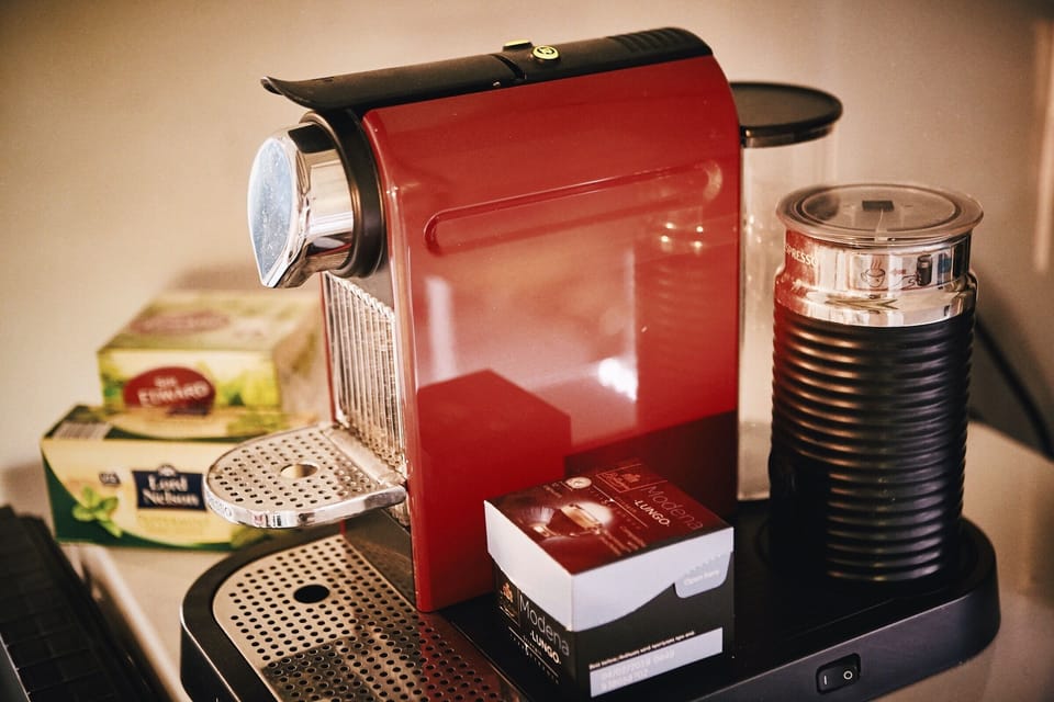 Coffee setup with complimentary Nespresso pods.