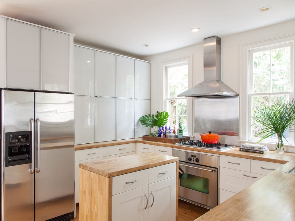 Stocked Kitchen with Dishwasher, Oven range, cookware.