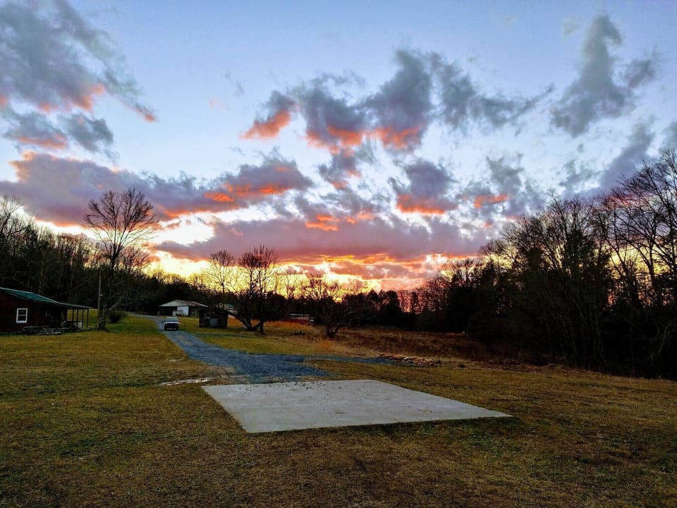sunset from cabin.... parking area... 