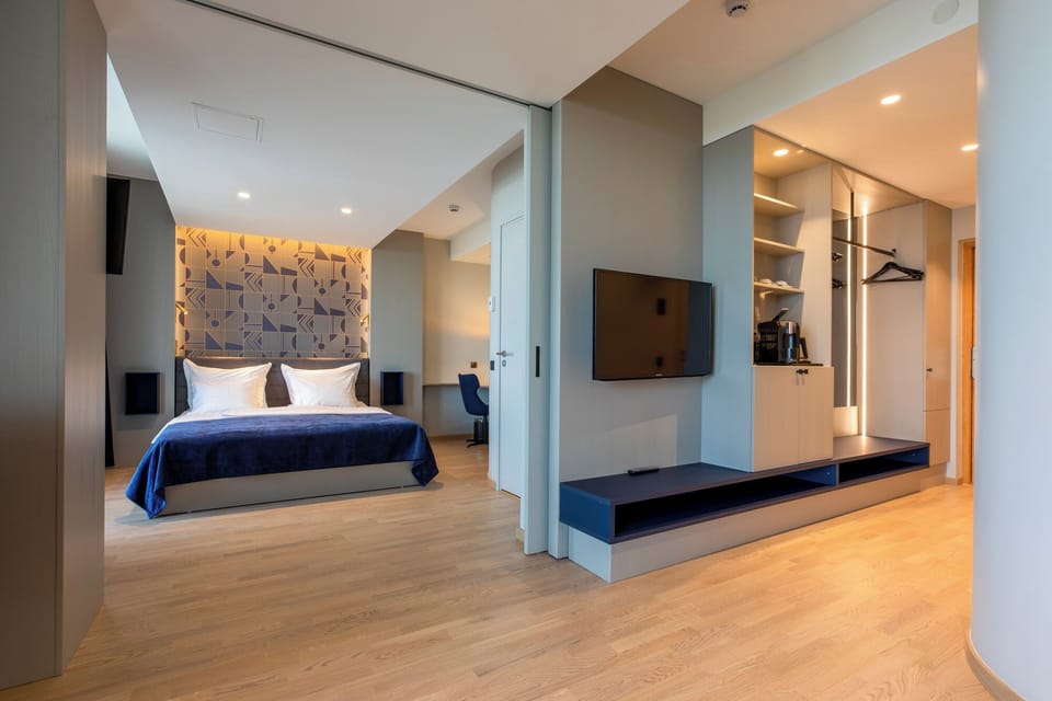 Suite, Balcony | In-room safe, desk, free WiFi, bed sheets