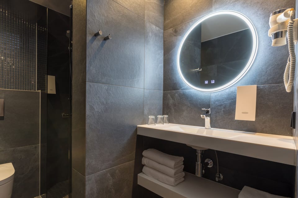 Standard Triple Room, Balcony | Bathroom | Shower, bathrobes, towels, soap