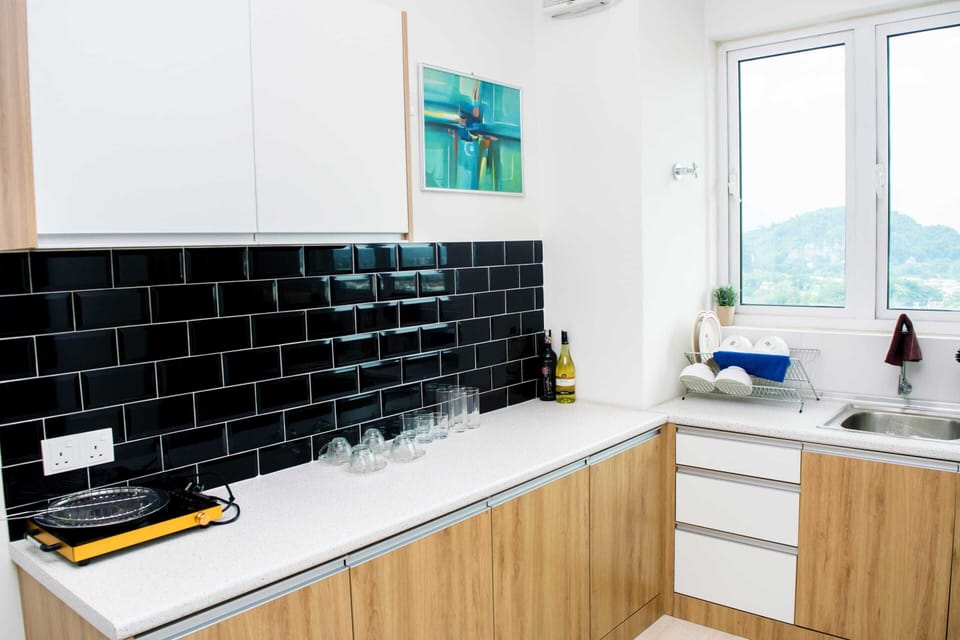 Family Penthouse | Private kitchen | Full-size fridge, electric kettle