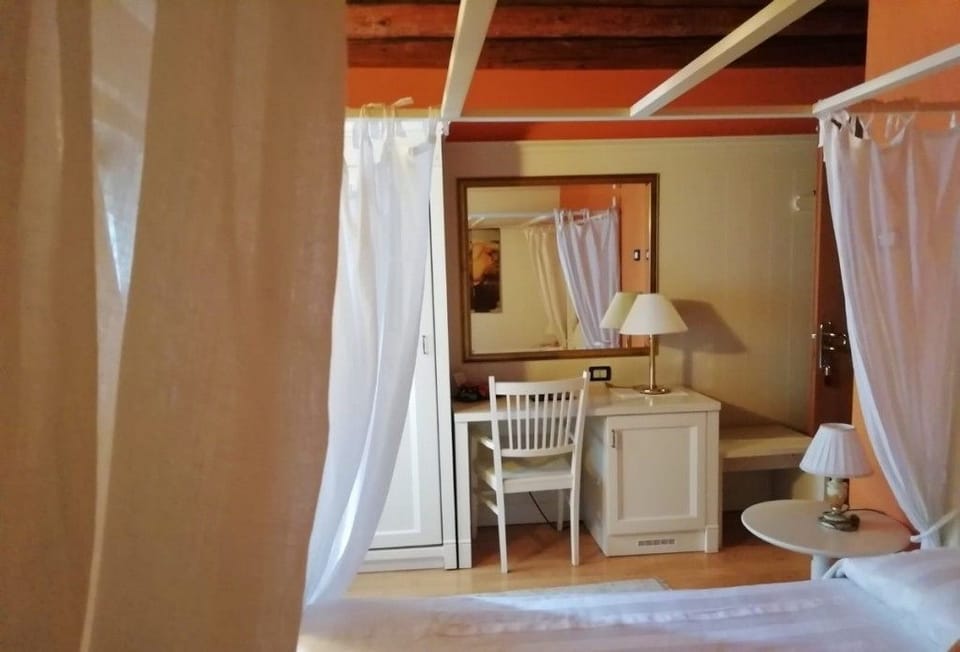 Junior Suite, Patio, Garden View | Minibar, in-room safe, soundproofing, free WiFi
