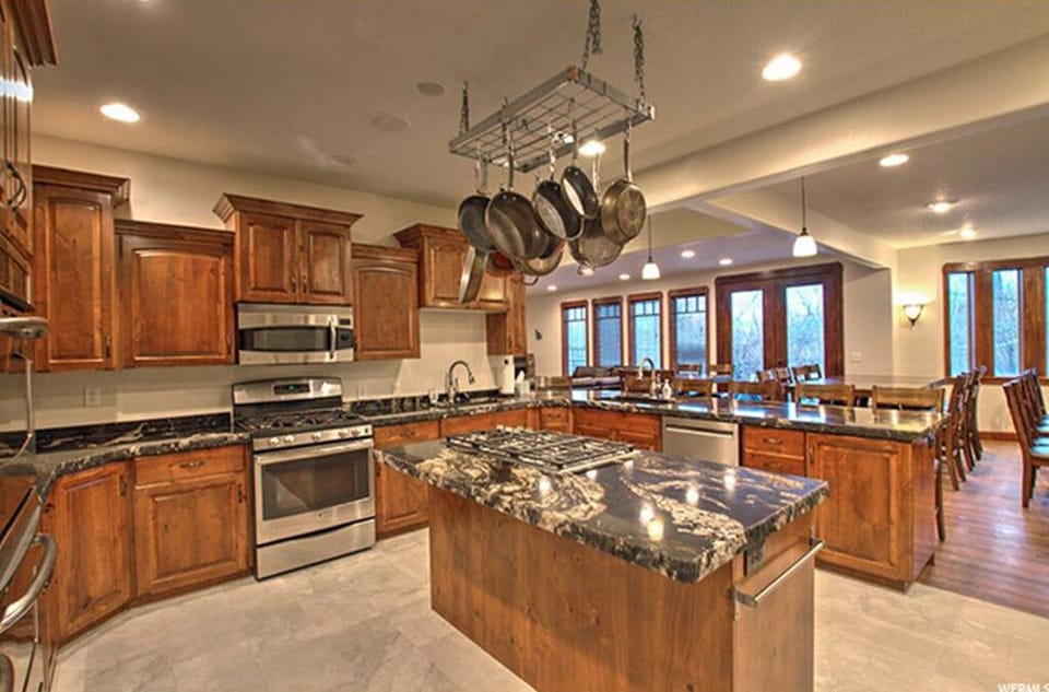 Kitchen- Plenty of dining space.  Everything you need to feed a large group!
