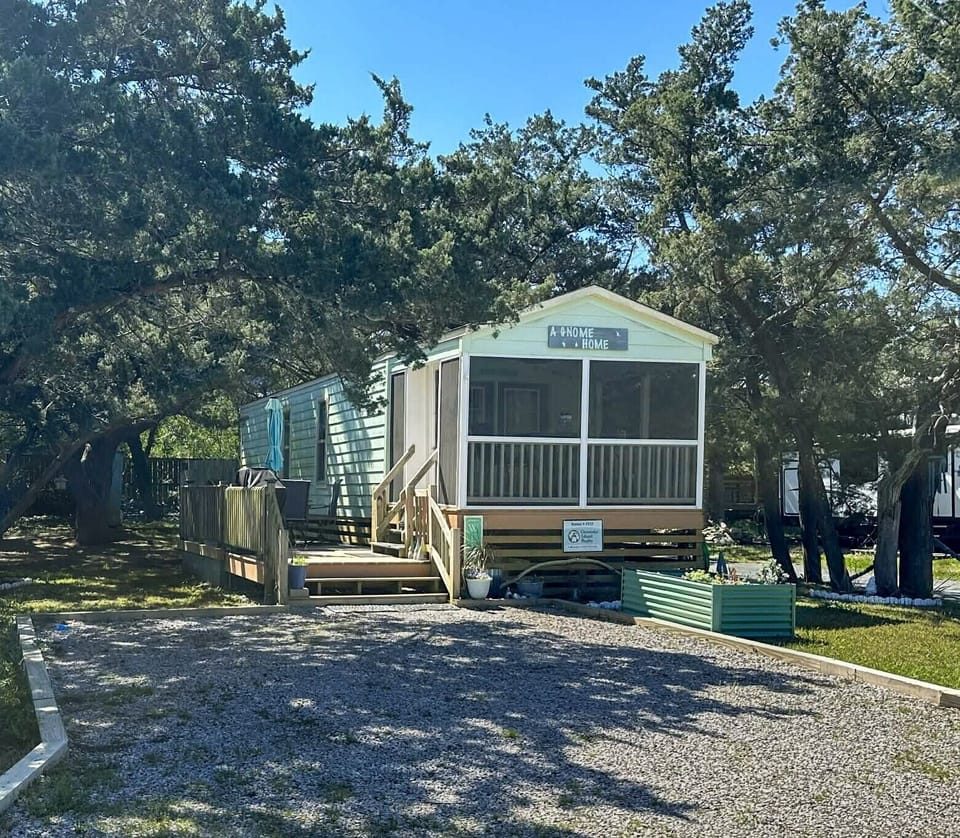 A Gnome Home  with 2 vehicle parking