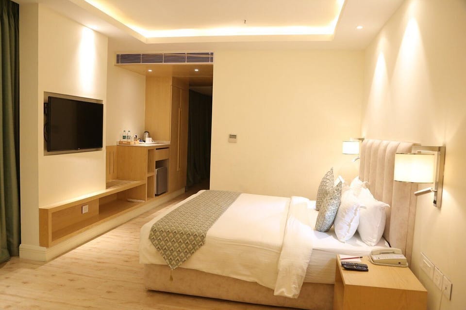 Minibar, in-room safe, desk, laptop workspace