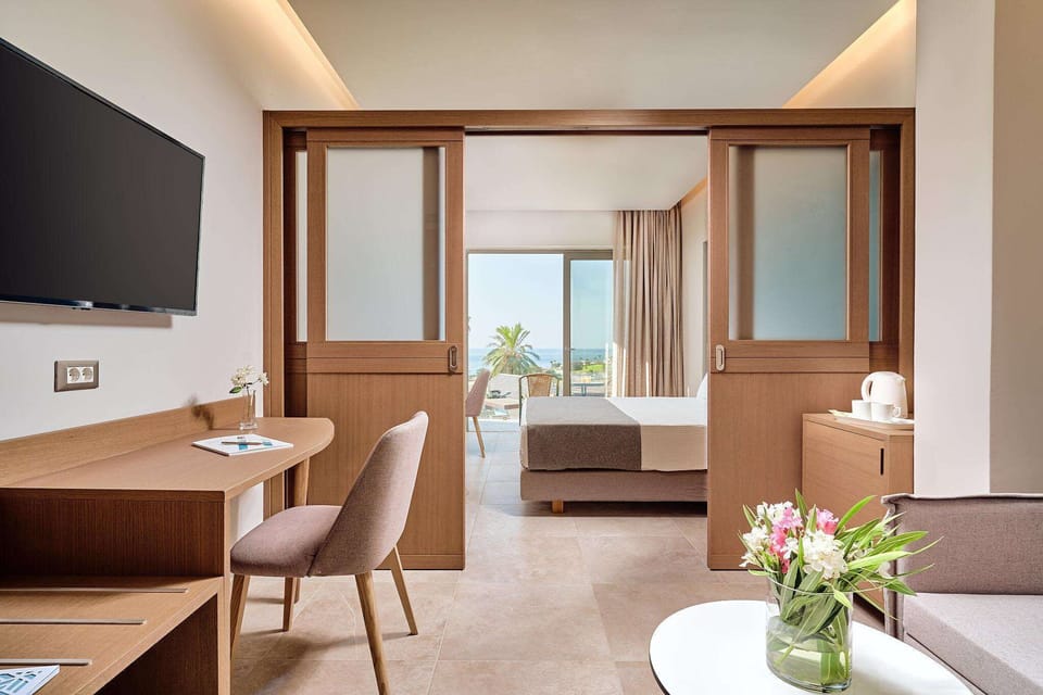 Junior Suite, Sea View | In-room safe, desk, laptop workspace, free WiFi