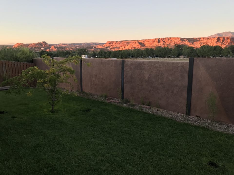 Backyard and mountains at sunset.