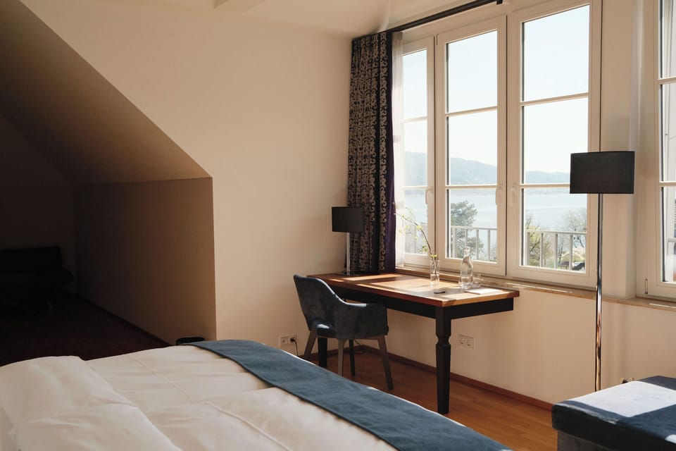 Suite, Balcony, Lake View | Hypo-allergenic bedding, in-room safe, desk, blackout drapes