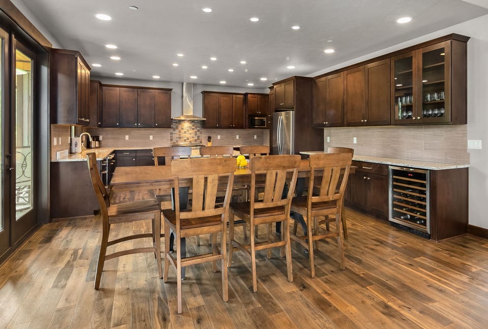 Fairway Lodge - Seating for 8 at the large dining room table.  Additional seating for 3 at the kitchen bar.