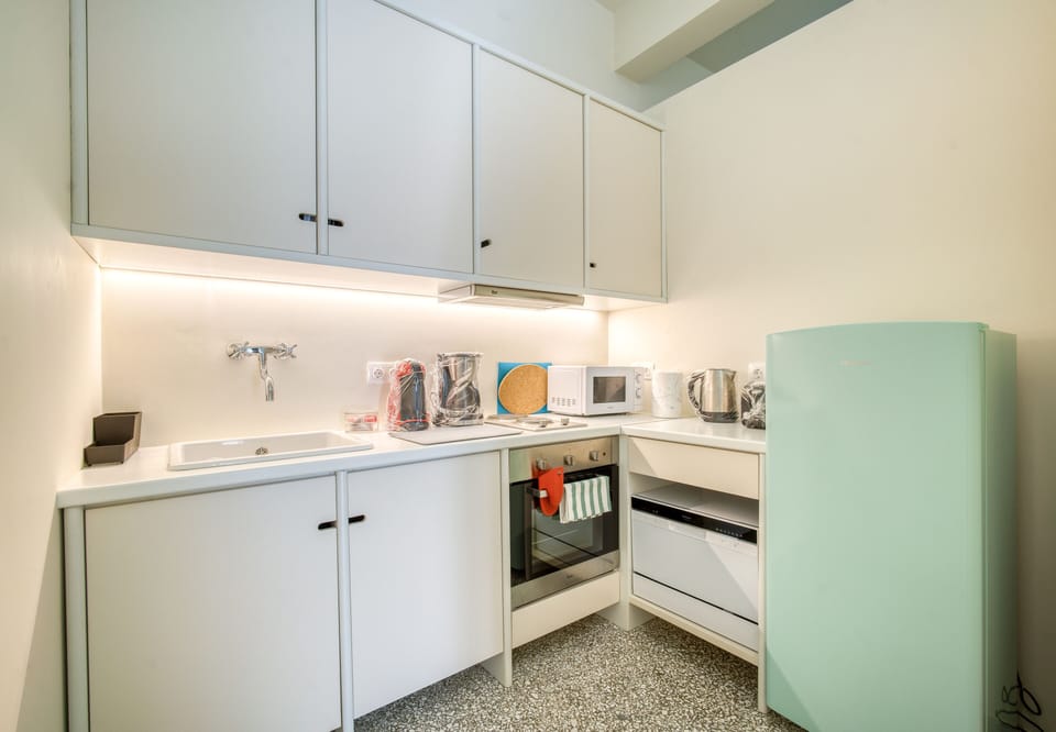 Design Apartment, 2 Bedrooms | Private kitchen | Fridge, microwave, oven, stovetop