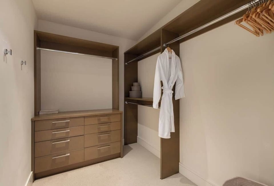 - Bedroom 1 – King room with sleek built-ins, warm wood accents, and soft light
- Spacious layout with modern comforts creates an easy relaxing flow
- A calm inviting retreat crafted for peaceful forest-side resting
