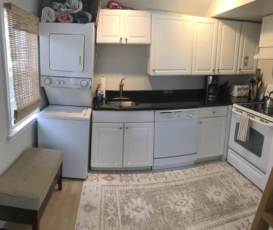 Kitchen with Washer/Dryer and Dishwasher.   Full size stove 