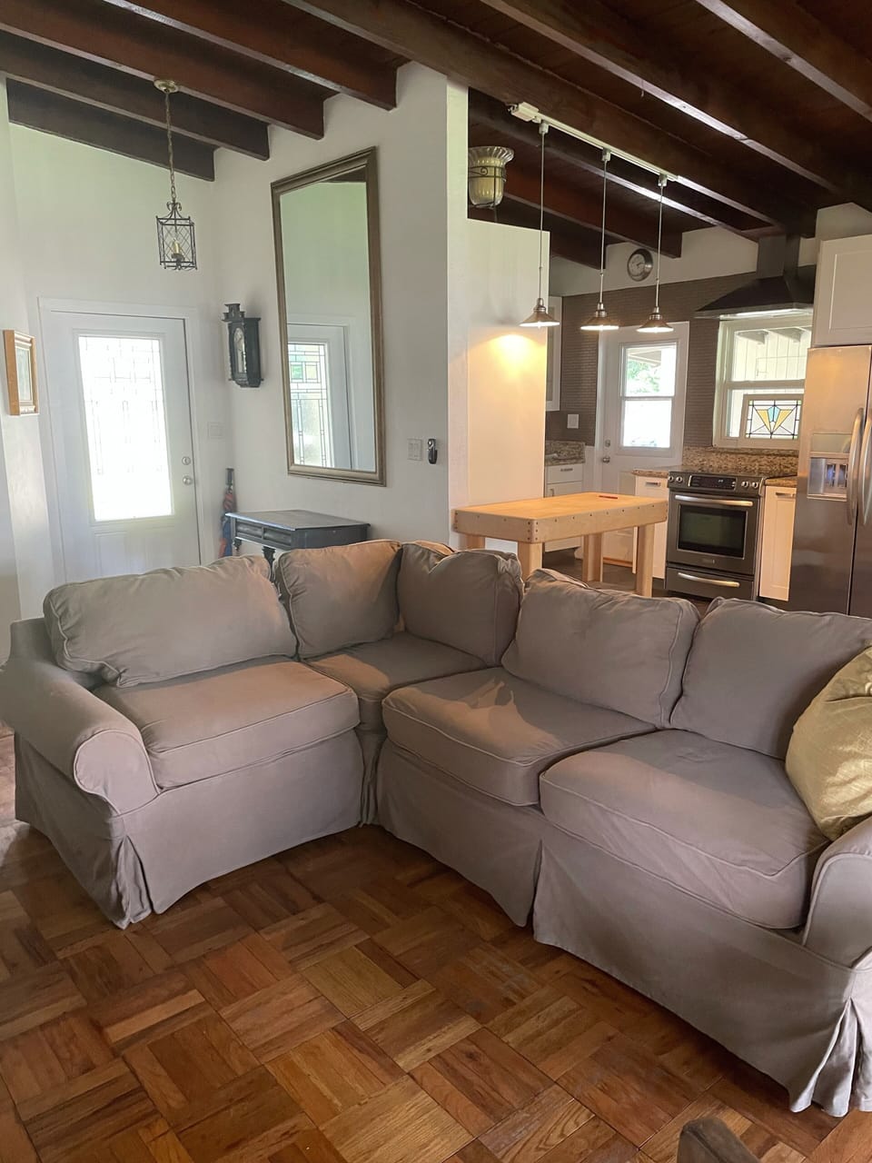 Living room looking into open kitchen