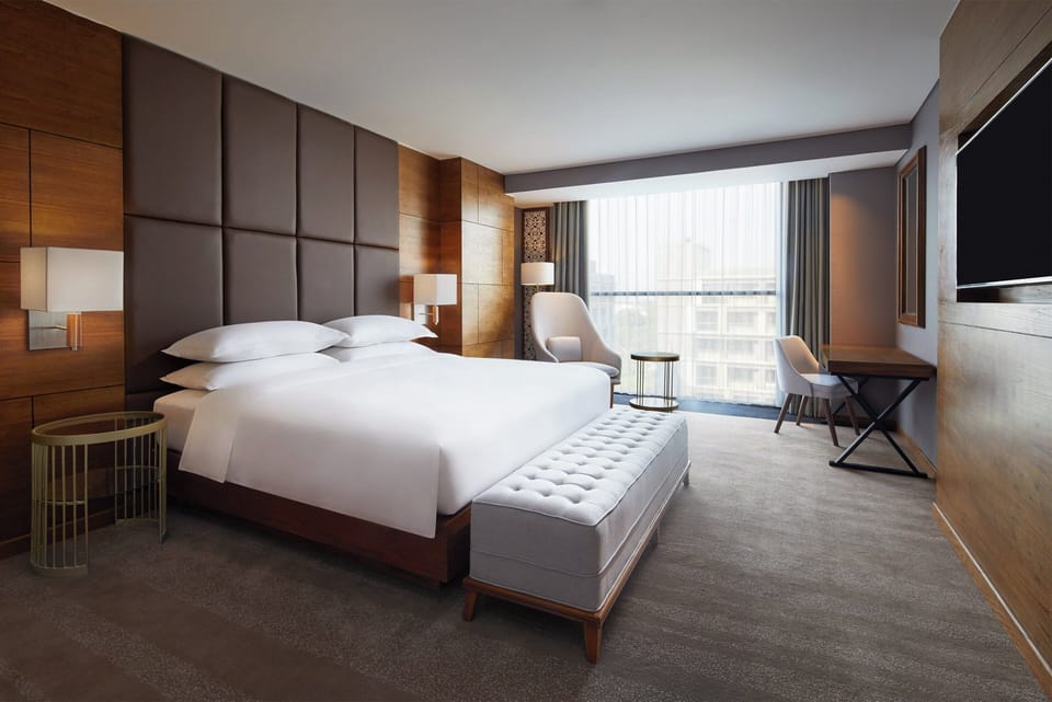Suite, 1 Bedroom, Pool View | Premium bedding, minibar, in-room safe, desk