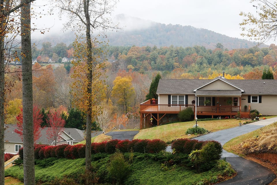 Front of the house, private driveway on the left