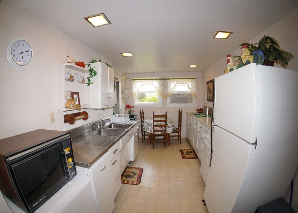 Kitchen-1 - Located downstairs. Kitchen with seating for 3.