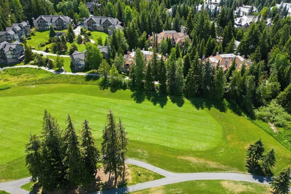 - Wide open golf course surrounded by Whistler’s lush forests  
- Ideal for peaceful walks, scenic runs, or tee time relaxation  
- Experience Whistler’s green beauty in every season  
