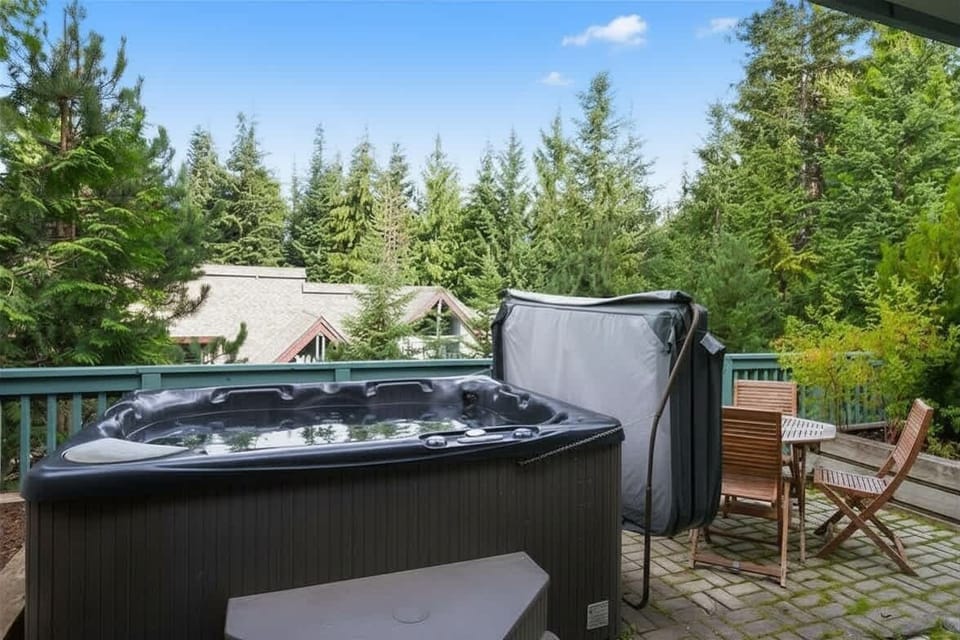- Private hot tub on deck with tranquil forest surroundings  
- Relax under open skies after Whistler skiing or mountain biking  
- Perfect outdoor spot for soaking and recharging in nature  
