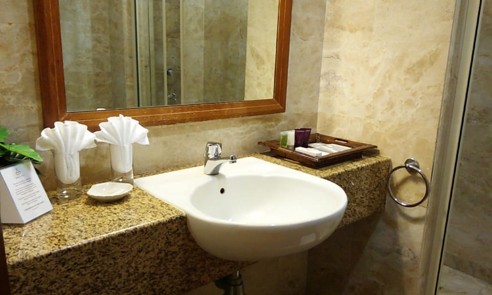 Standard Studio Suite (@ Sea Village) | Bathroom | Shower, free toiletries, slippers, towels