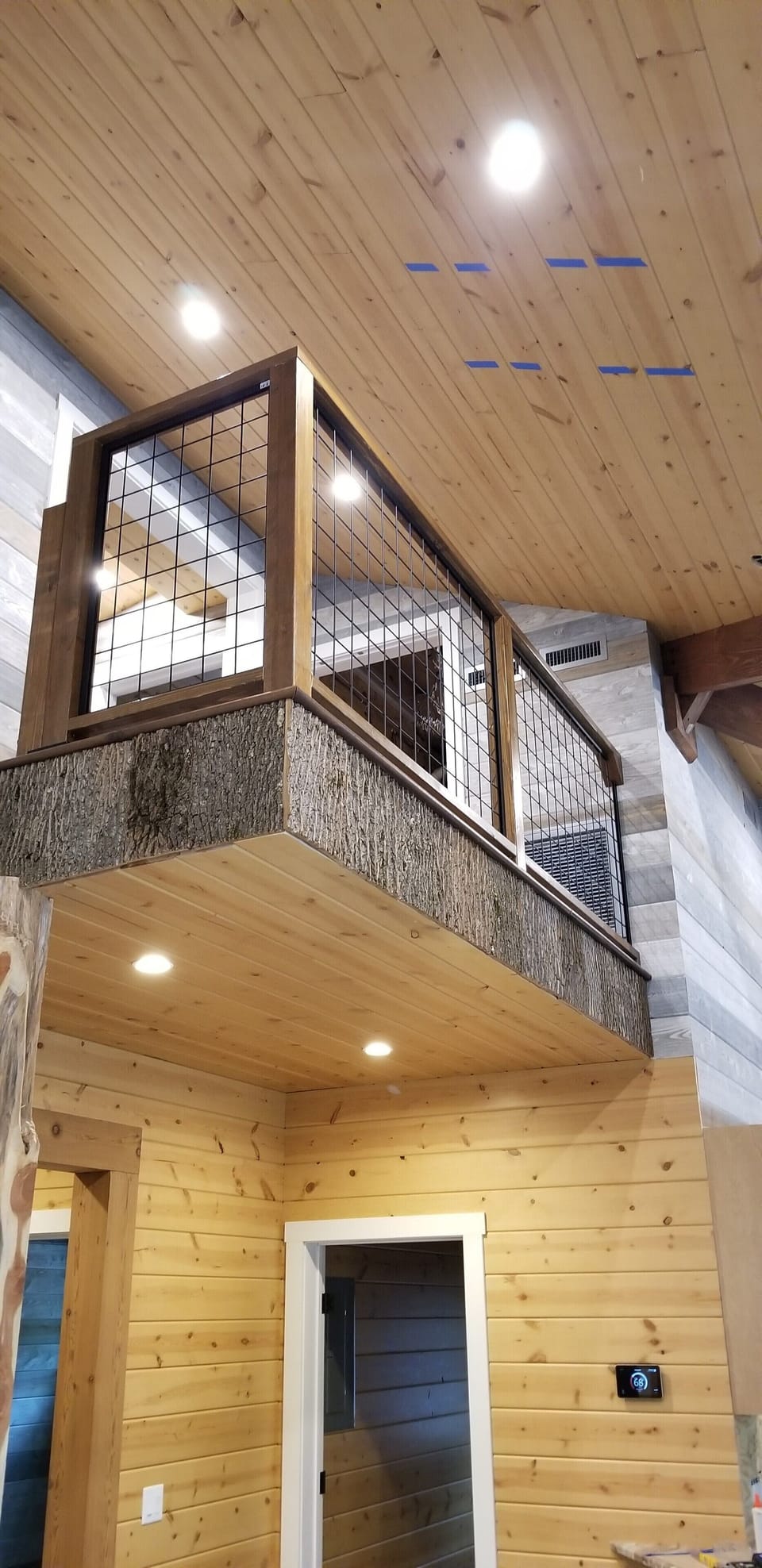 Balcony above living and kitchen area