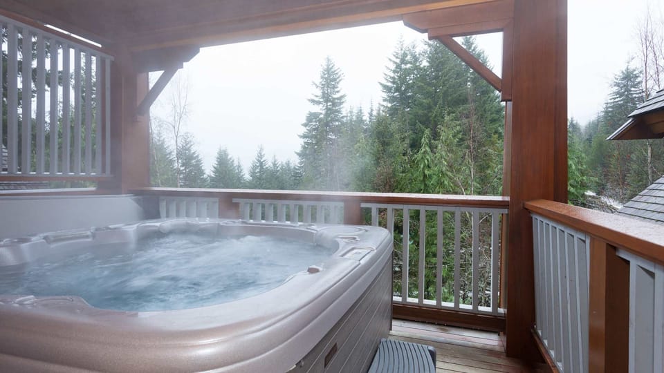 - Private outdoor hot tub with steamy mountain views year-round  
- Relax and unwind after skiing surrounded by fresh alpine air  
- Perfect retreat to soak under the pines and starry Whistler skies  
