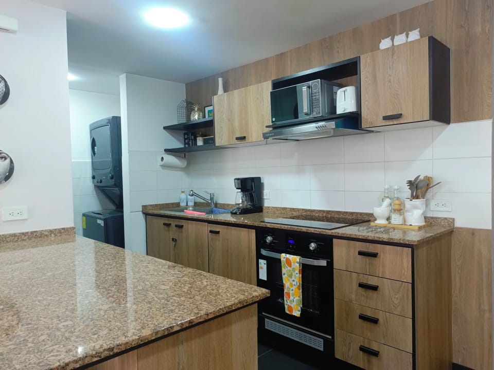 Cocina equipada con lo necesario para preparar tu comida favorita 