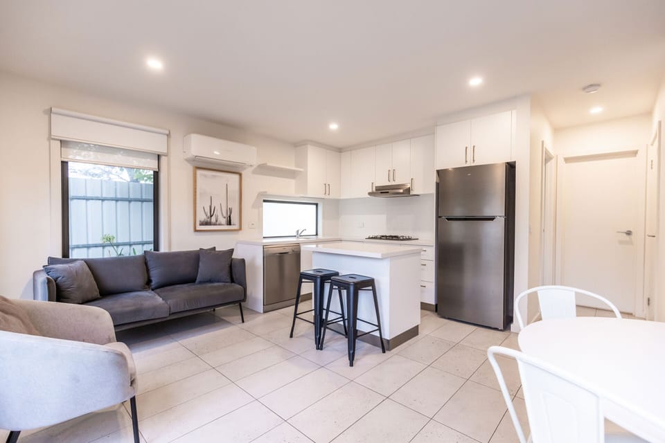 Three Bedroom Deluxe Double Storey Villa | Living area | TV